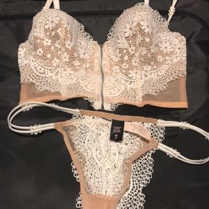 White and cream lacy bustier with matching panty.